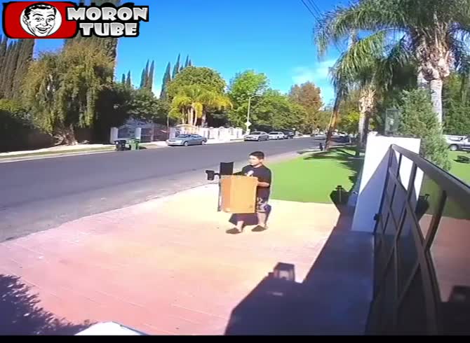 Video :A child would take packages from the porch